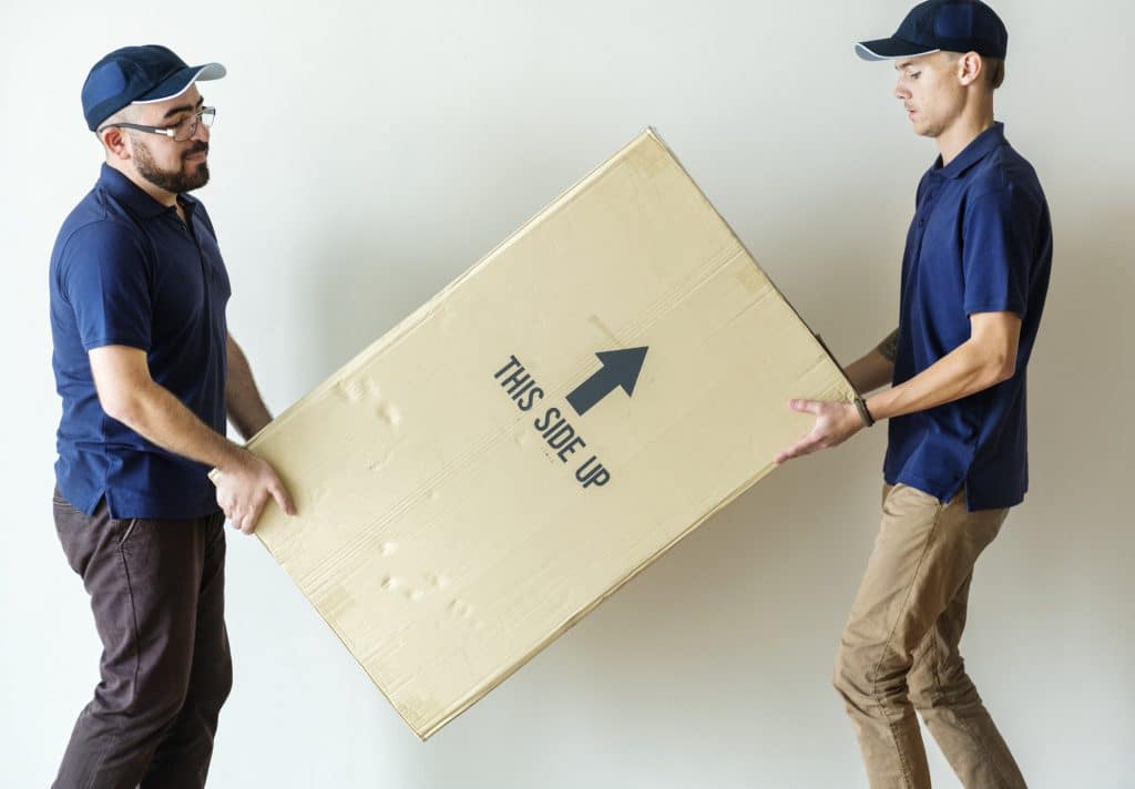 men moving boxes