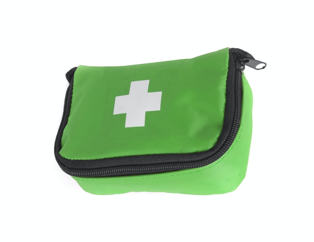 first aid bag isolated on white