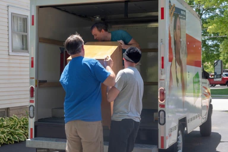 People loading a truck on moving day